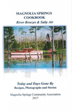 Cookbook cover with a scenic image of a dock and trees, titled 'Magnolia Springs Cookbook'.