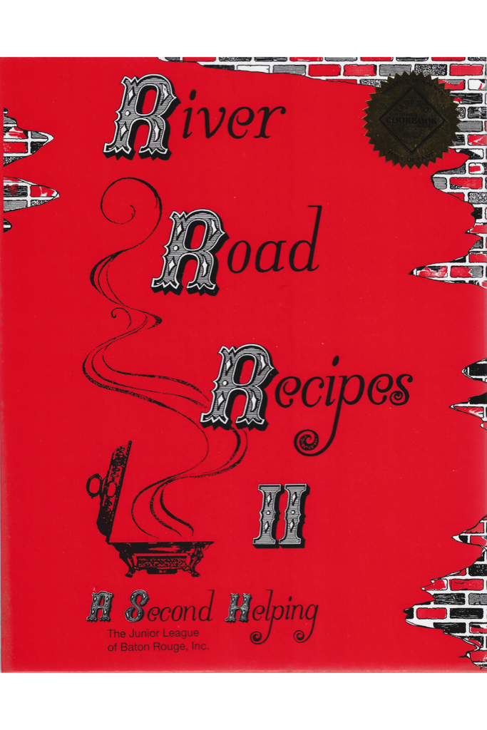 Red cookbook cover titled 'River Road Recipes II' with decorative elements on a white background