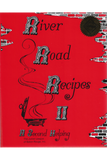 Red cookbook cover titled 'River Road Recipes II' with decorative elements on a white background